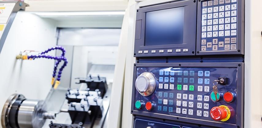 CNC machinery and control panels at 3D Visual Publications